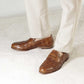 Elegant vintage brown men's loafer in woven leather