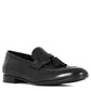 Elegant men's loafer in soft black leather with tassels